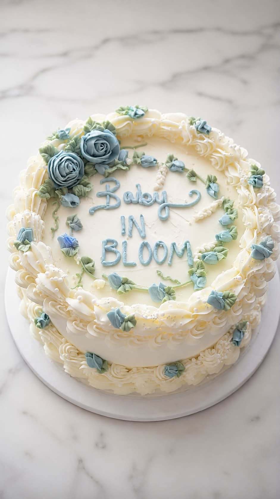 Baby in Bloom buttercream rose cake