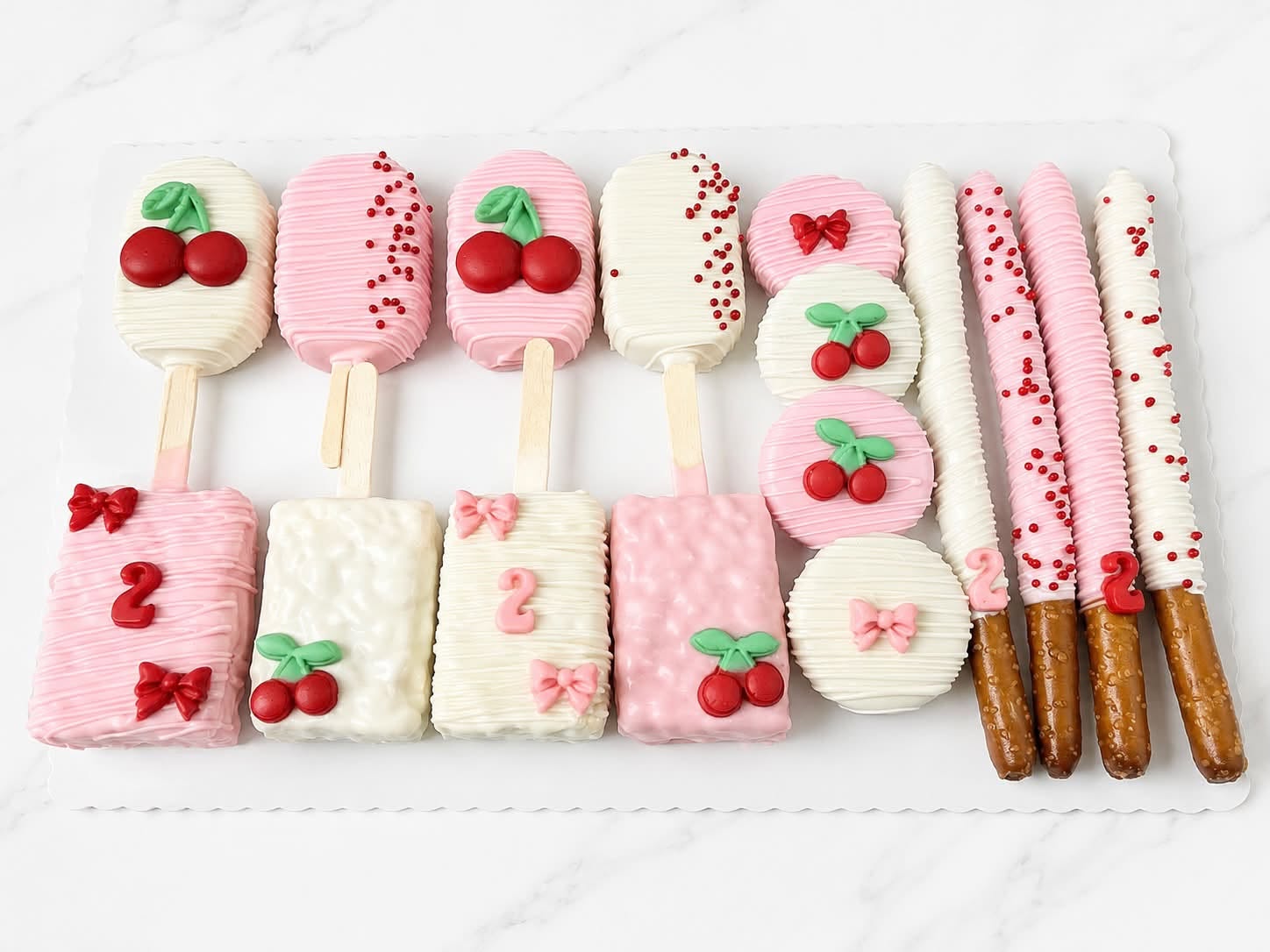 Cherry cakesicles and chocolate-dipped pretzels